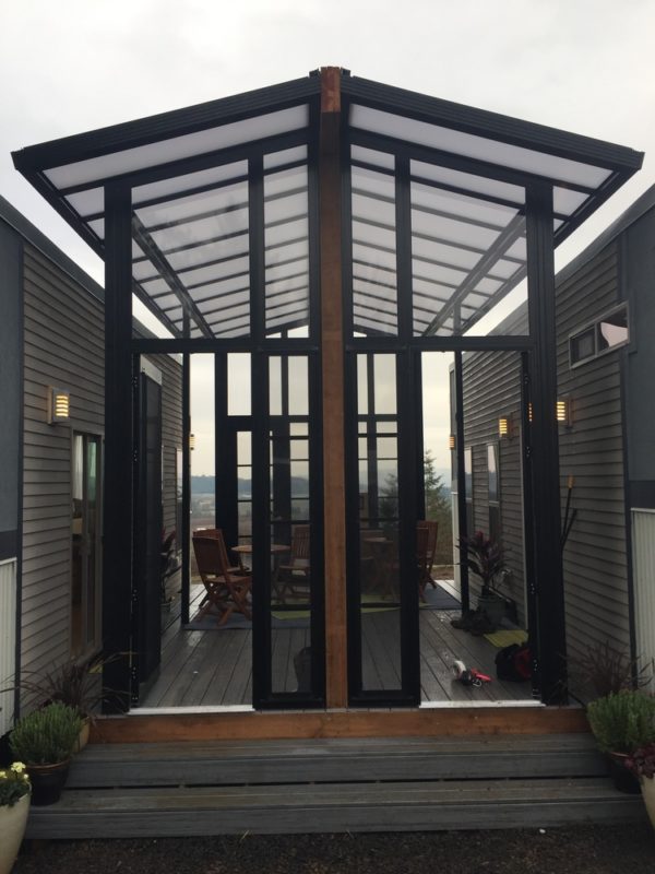 Two 24 Tiny Houses Connected by Sunroom