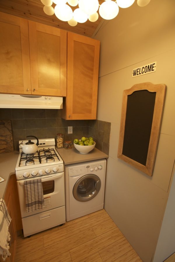 Two 24 Tiny Houses Connected by Sunroom