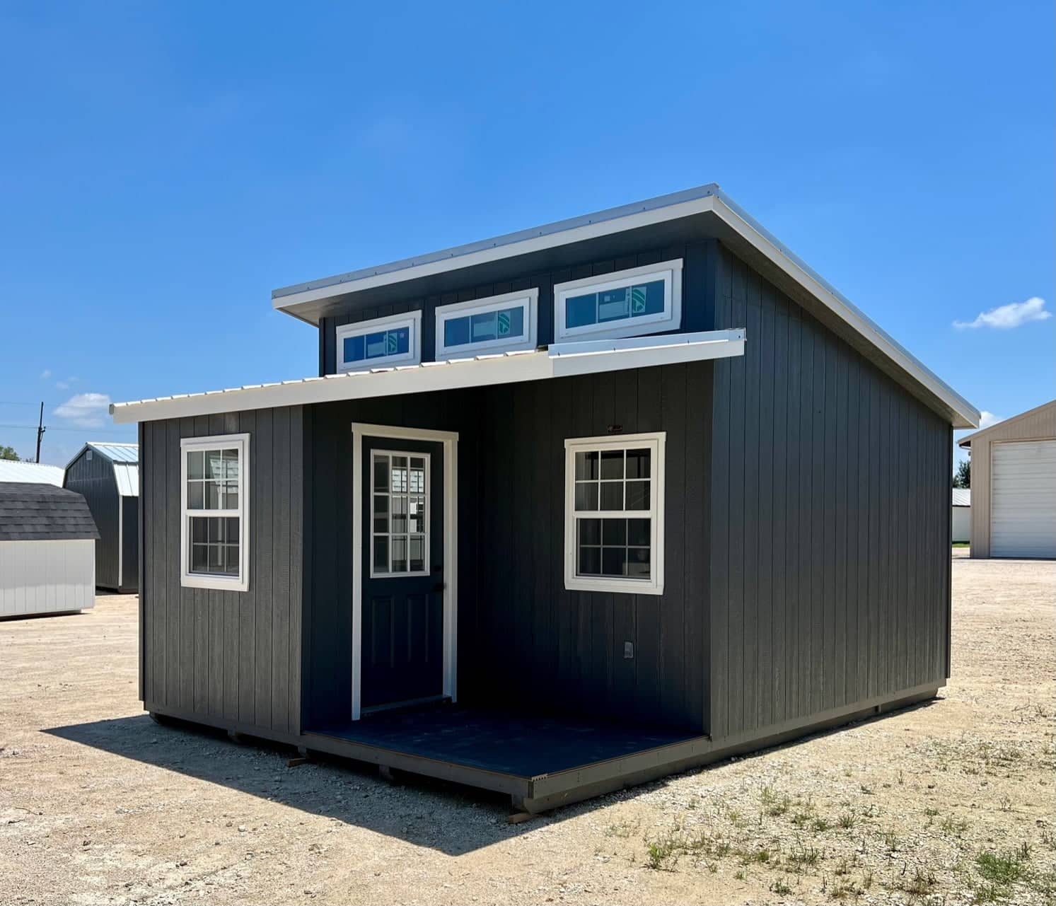 14×20 Studio Cabin: Step Inside This Stunning Finished Retreat With a Cozy Corner Porch